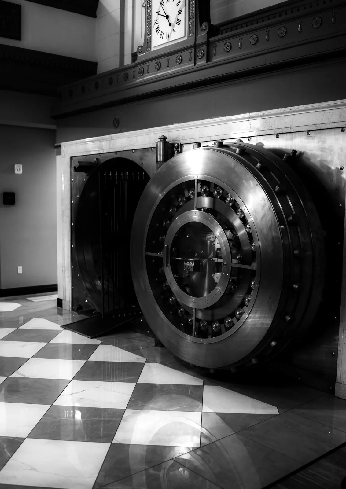 A vault door in a marble hall